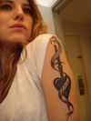 love heart tattoo on girl's arm